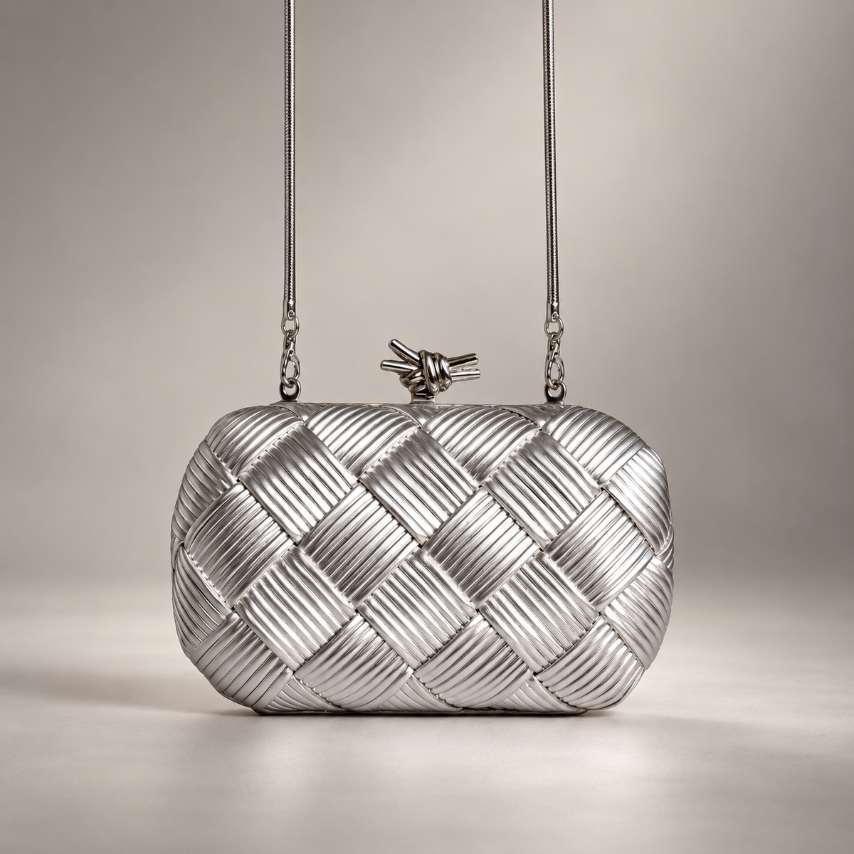 Camille Woven Metallic Evening Clutch Bag with Knot Clasp