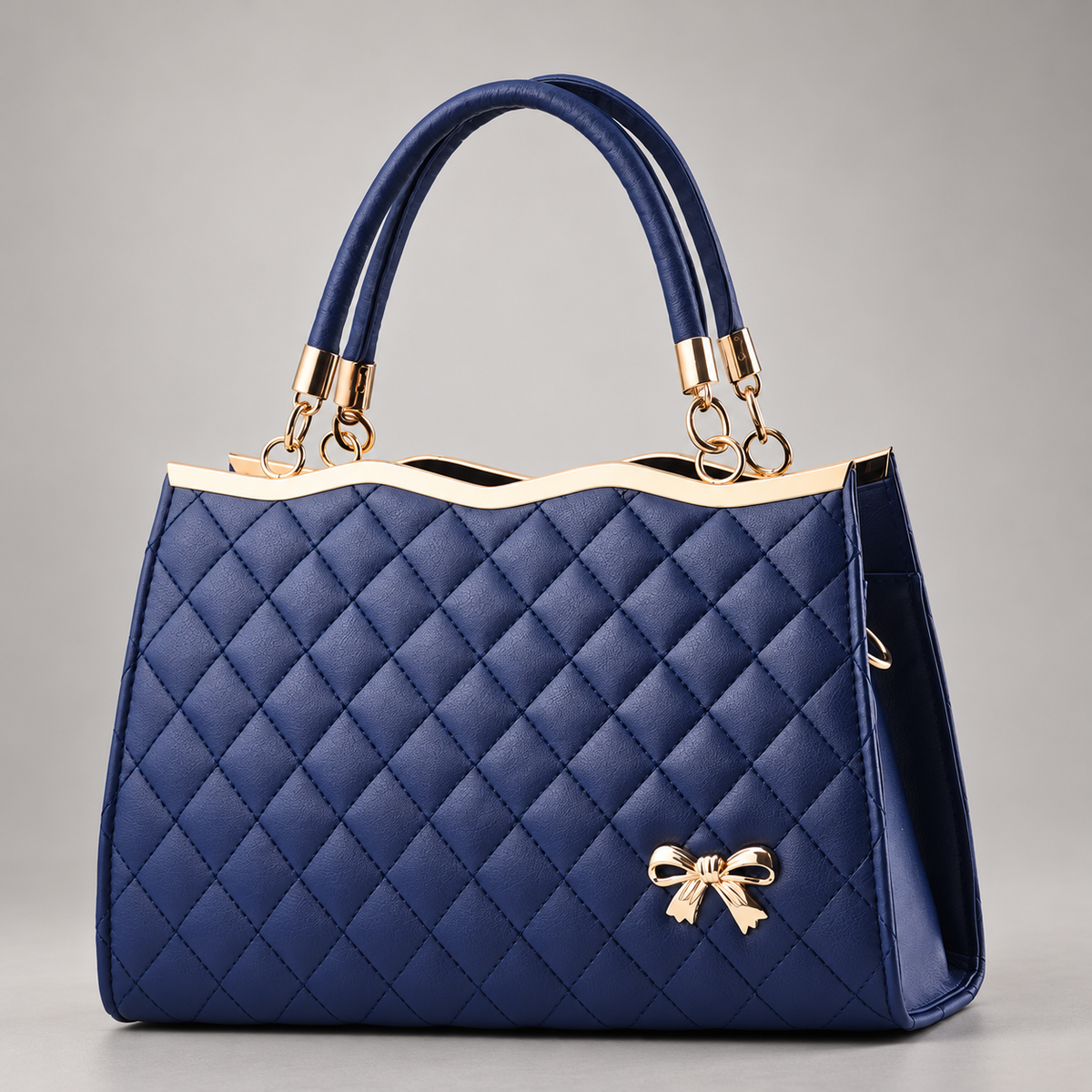 Sidonie Women’s Diamond Quilted Handbag with Gold Bow Detail