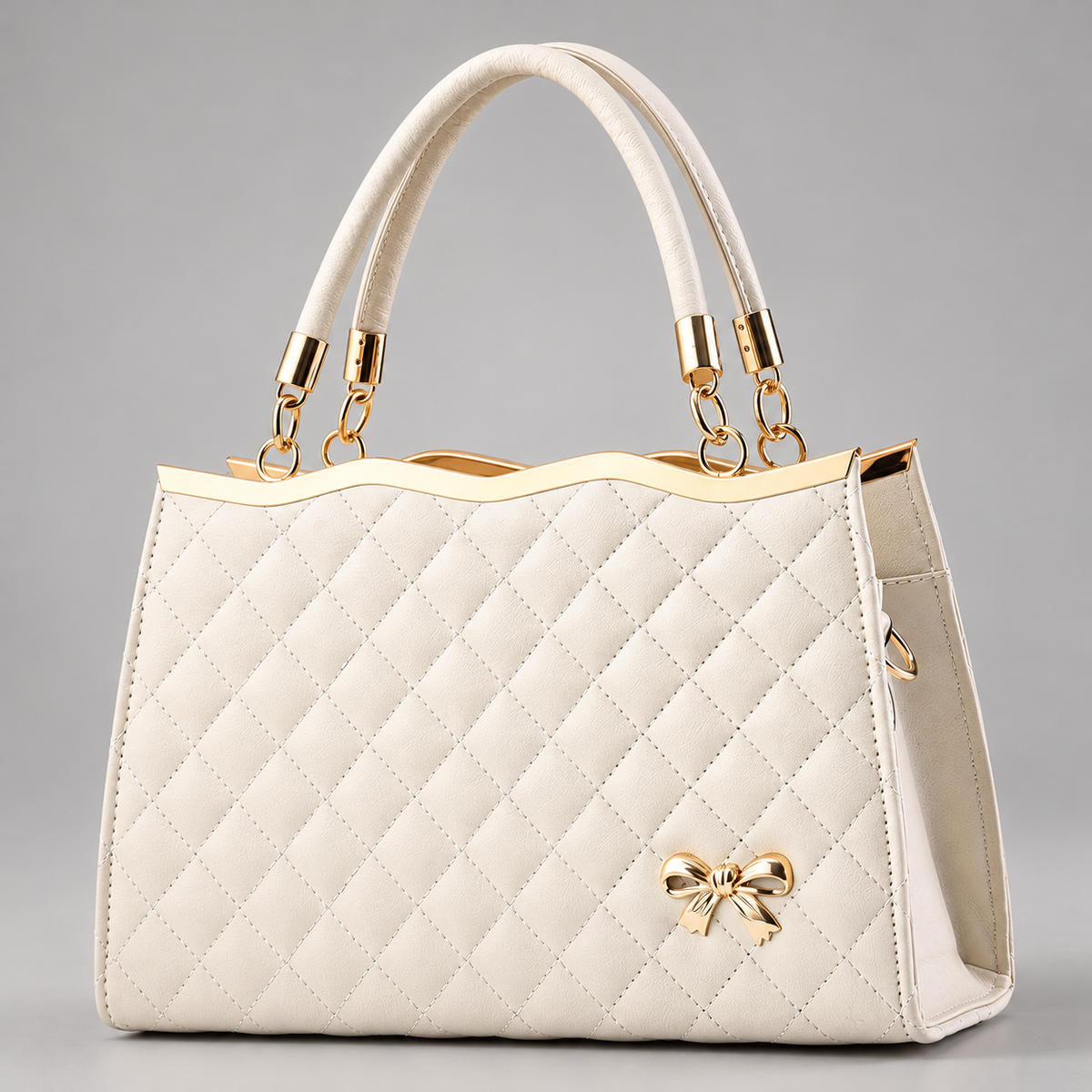 Sidonie Women’s Diamond Quilted Handbag with Gold Bow Detail
